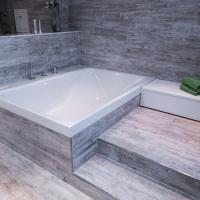Bad, Badmöbel, Kieppe, R+F, Richter, Frenzel, Fliesen, Steinoptik, Regendusche, ebenerdig, Entertain, Flat-TV, Doppelwaschtisch